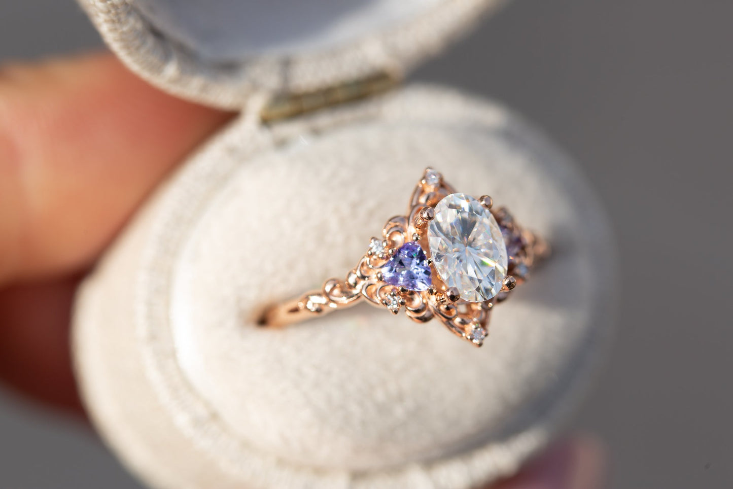 Oramore jewelry Aurora three stone with oval moissanite and tanzanite