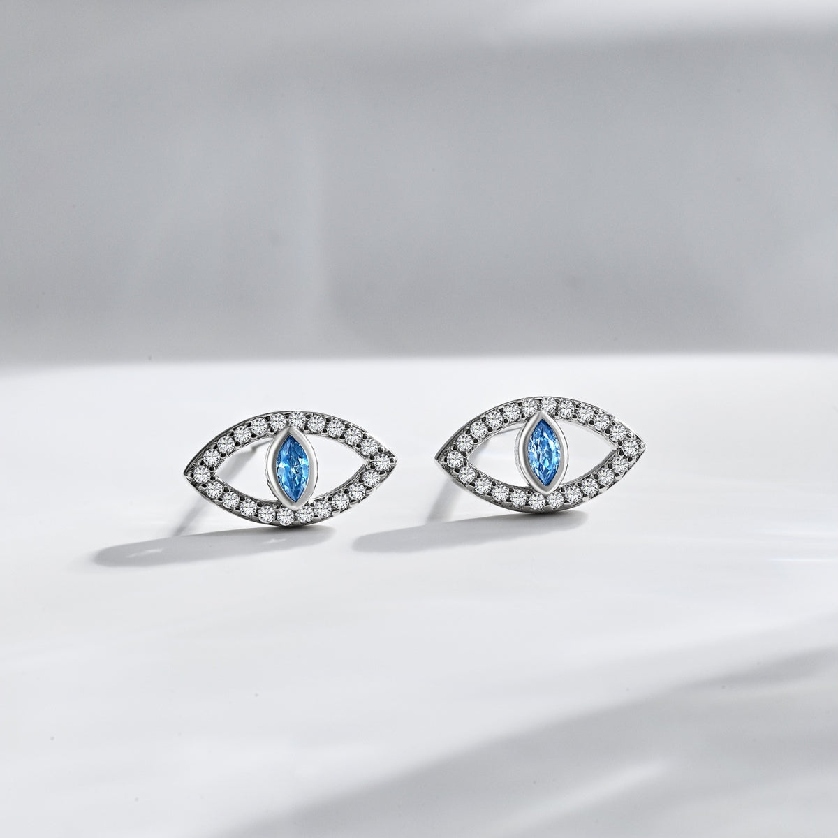 [Oramore Jewelry]Blue Devil Eyes Hollow Stud Earrings