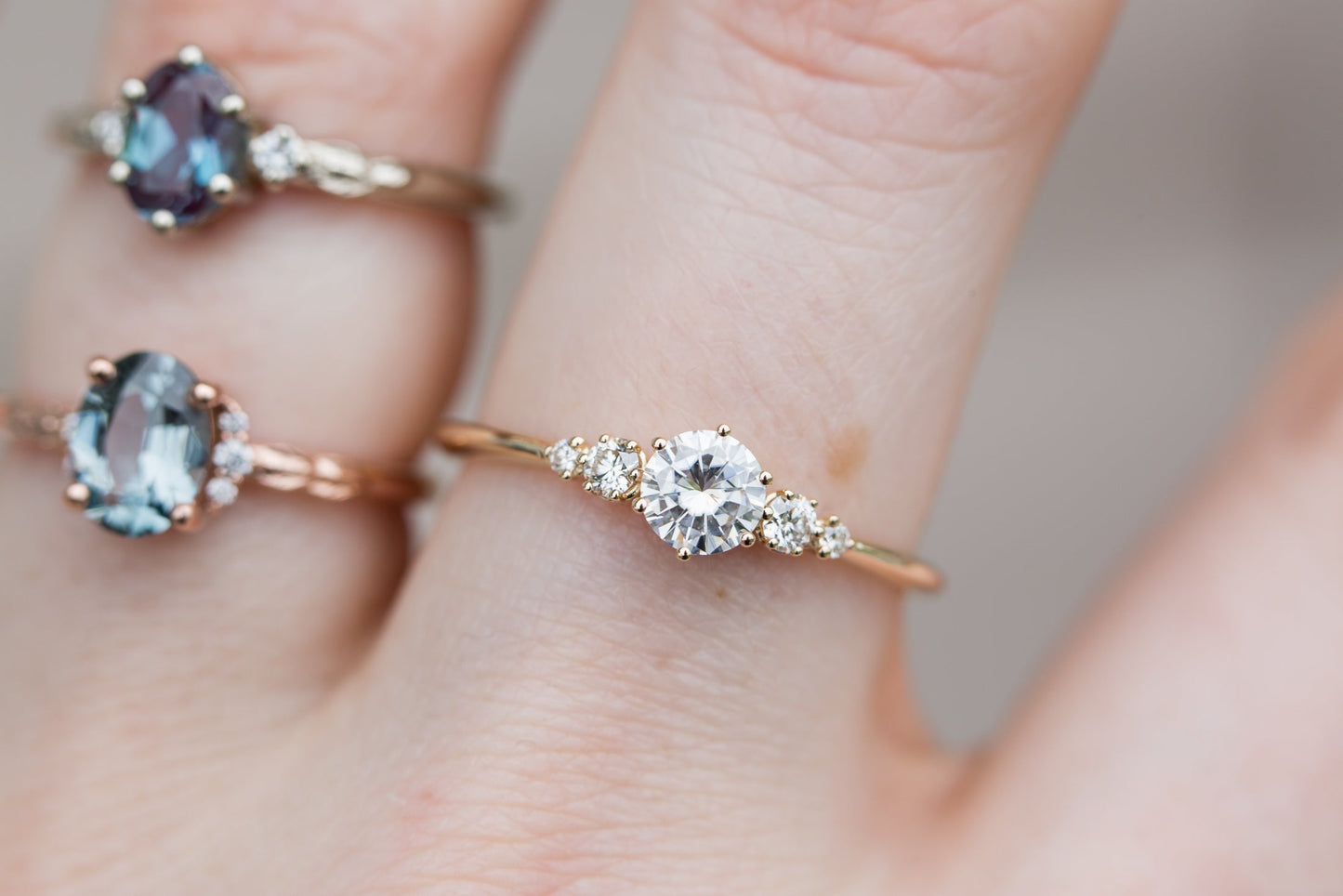 [Oramore Jewelry]Moissanite with round diamond side stones, five stone ring