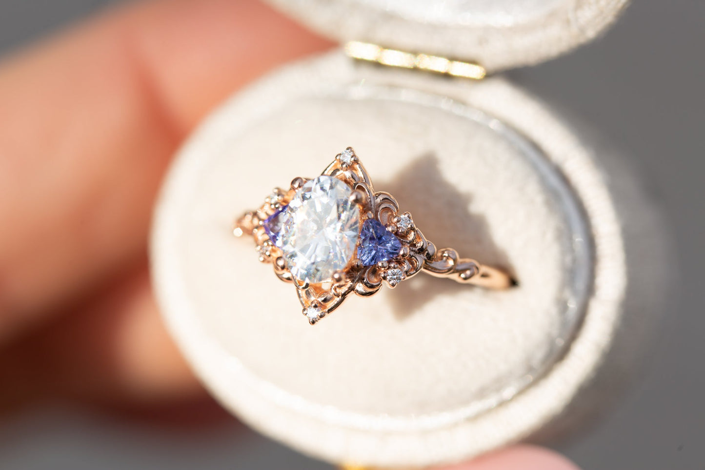 Oramore jewelry Aurora three stone with oval moissanite and tanzanite