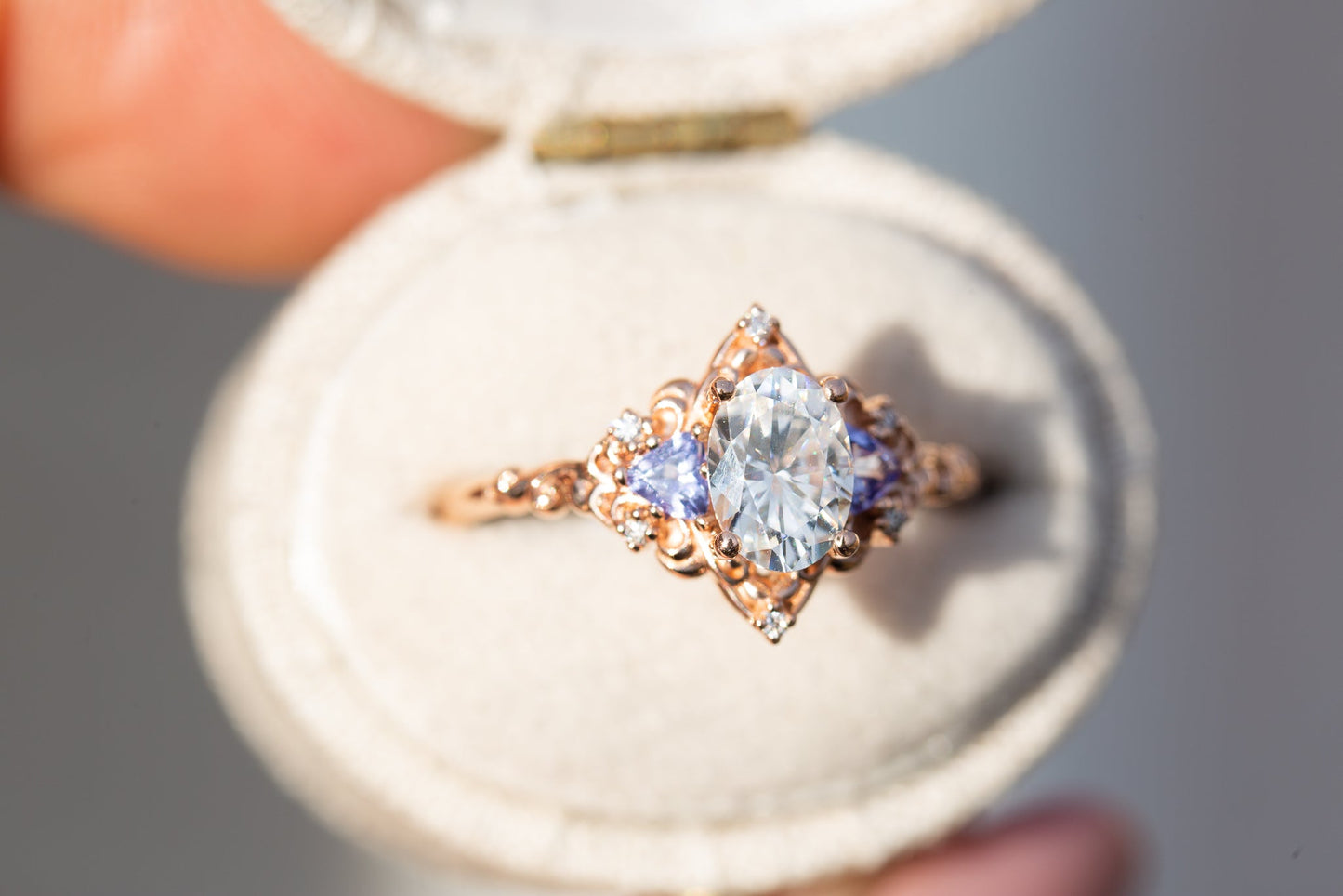 Oramore jewelry Aurora three stone with oval moissanite and tanzanite
