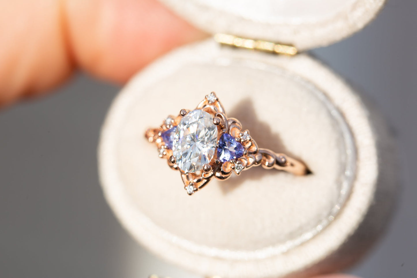 Oramore jewelry Aurora three stone with oval moissanite and tanzanite
