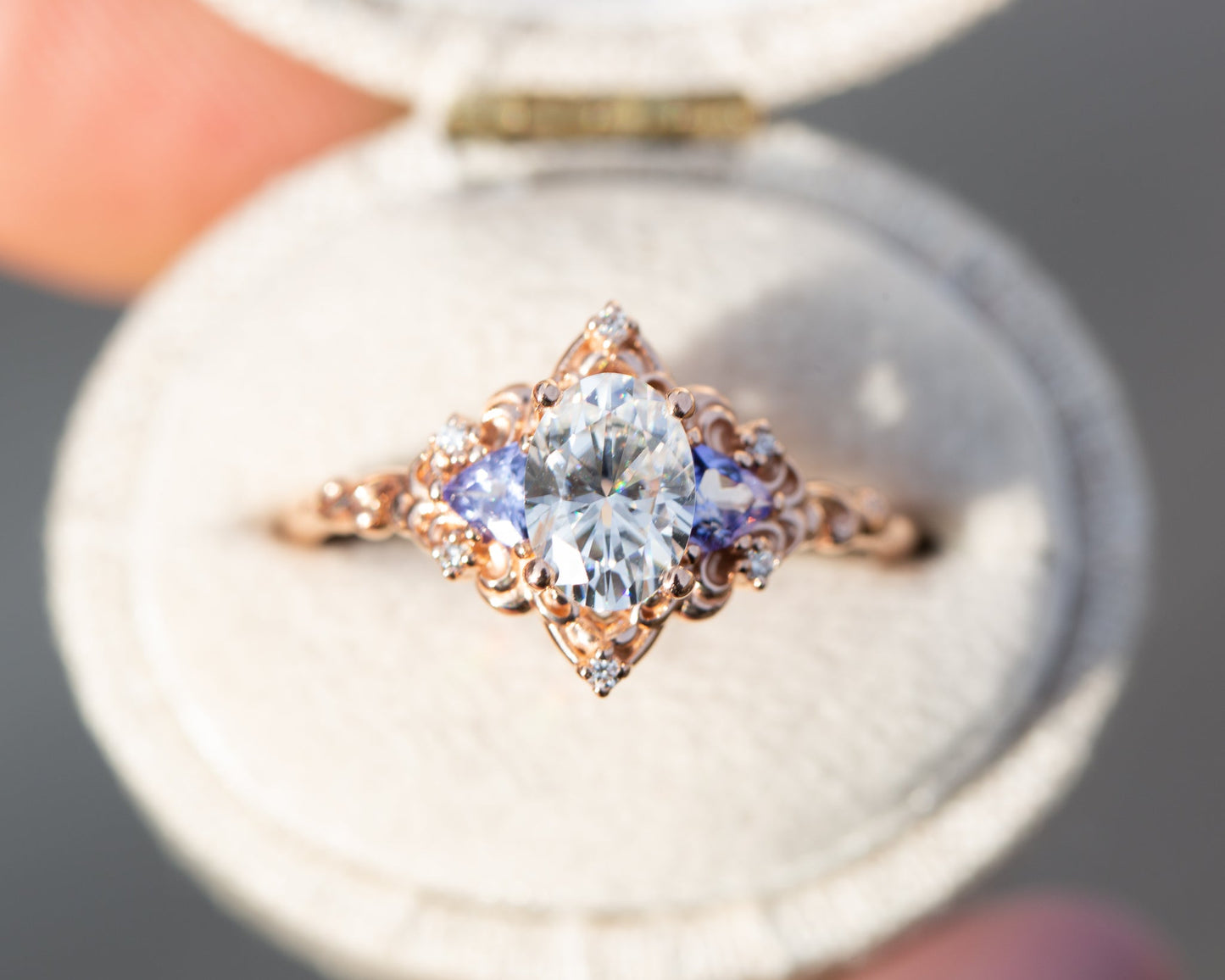 Oramore jewelry Aurora three stone with oval moissanite and tanzanite