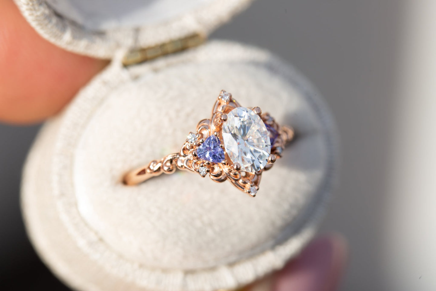 Oramore jewelry Aurora three stone with oval moissanite and tanzanite