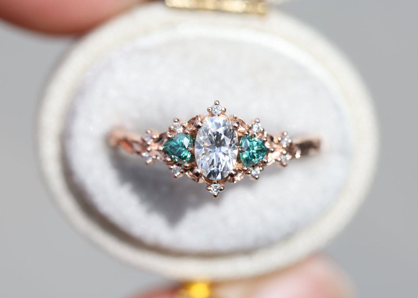 [Oramore Jewelry]Briar rose three stone with oval moissanite and teal moissanite side stones