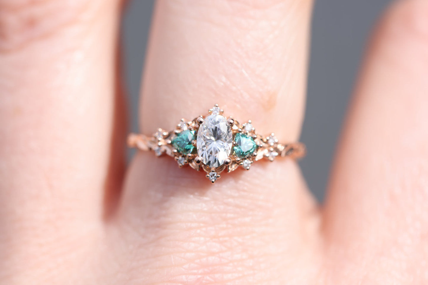 [Oramore Jewelry]Briar rose three stone with oval moissanite and teal moissanite side stones