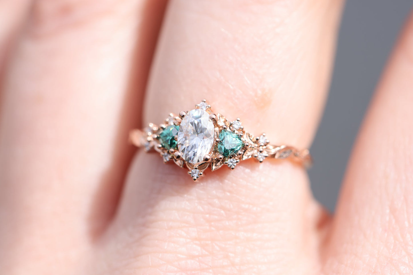 [Oramore Jewelry]Briar rose three stone with oval moissanite and teal moissanite side stones