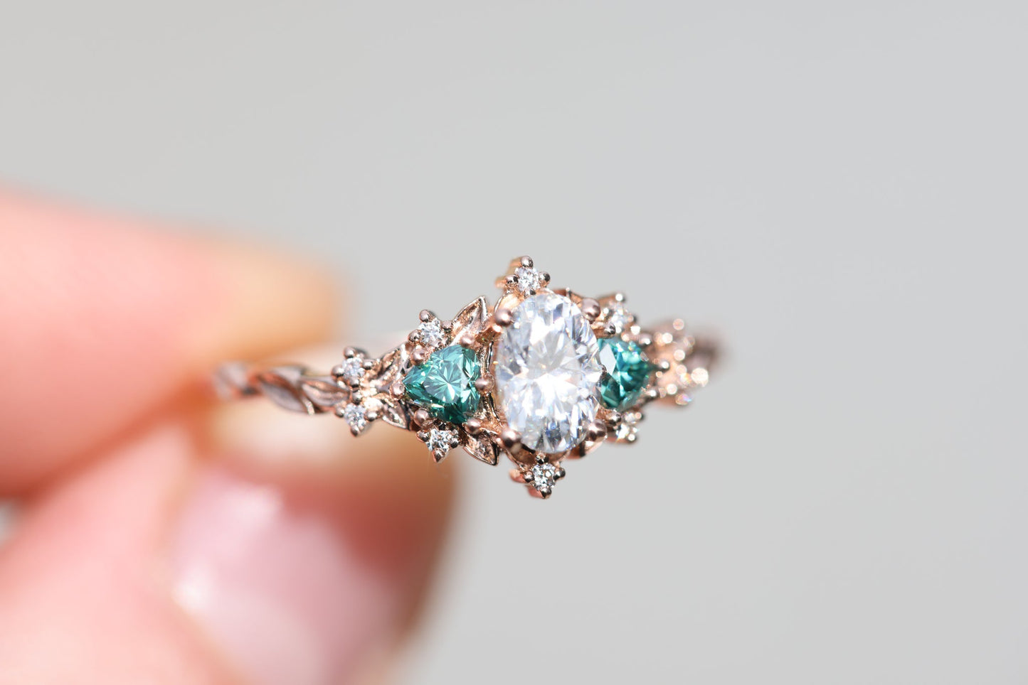 [Oramore Jewelry]Briar rose three stone with oval moissanite and teal moissanite side stones
