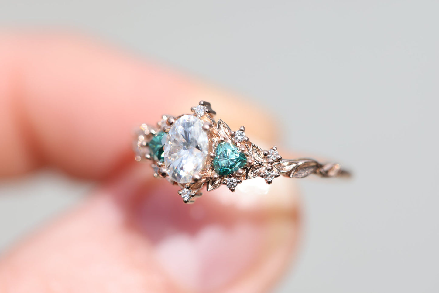 [Oramore Jewelry]Briar rose three stone with oval moissanite and teal moissanite side stones
