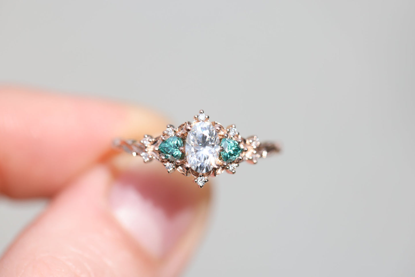 [Oramore Jewelry]Briar rose three stone with oval moissanite and teal moissanite side stones