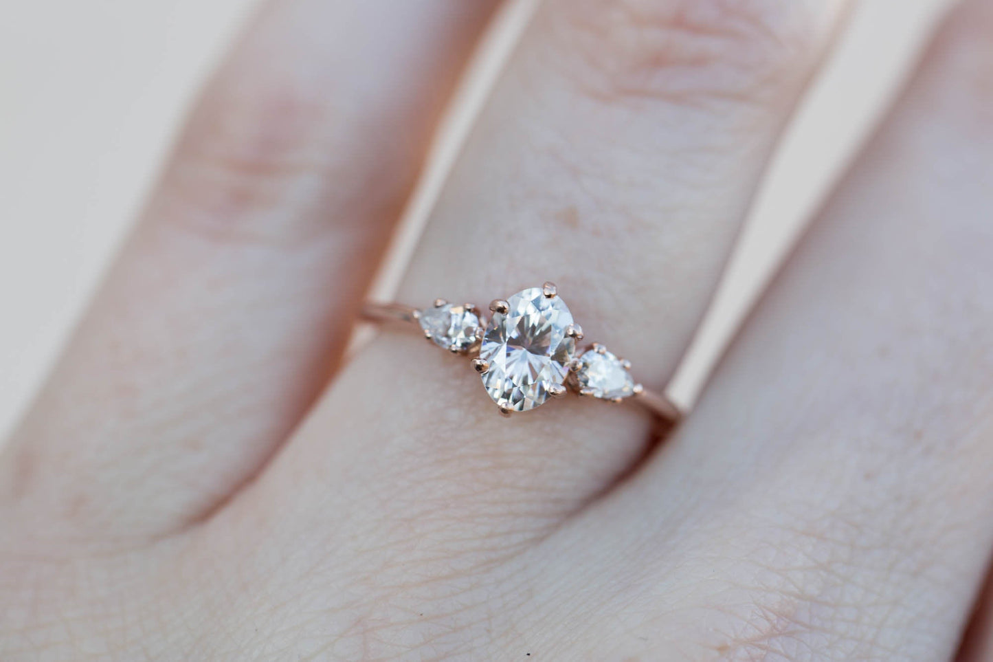 [Oramore Jewelry]Oval moissanite three stone engagement ring, pear side stone